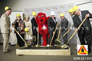 [From left to right, Russ Leatherby, Mary Lyons, Jo Ellen Chatham, Ed Arnold, Clifford, Mel Rogers the president and CEO of PBS SoCal, Mayor Gary Monahan, Heidi Cortese, and Paul Musco during a groundbreaking ceremony for the new PBS SoCal news studio in Costa Mesa on Thursday. (Scott Smeltzer)] *** []